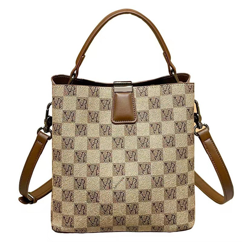 Hong Kong purchasing genuine leather bucket bag for women 2023 spring and summer new high-end large-capacity portable shoulder crossbody bag trendy