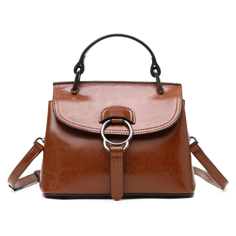 Summer new foreign trade genuine leather women's bag European and American fashion metal lock buckle portable shoulder crossbody bag can be shipped