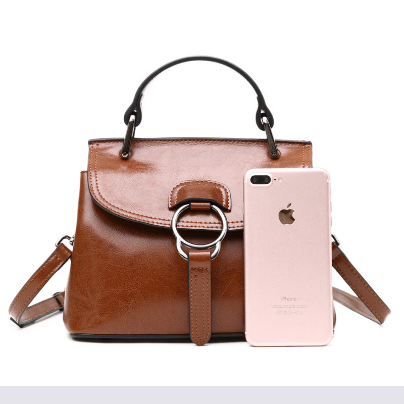 Summer new foreign trade genuine leather women's bag European and American fashion metal lock buckle portable shoulder crossbody bag can be shipped