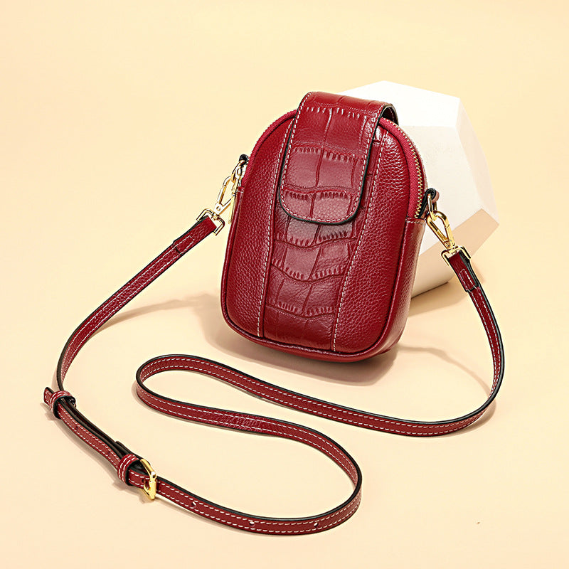 2020 new solid color vertical style women's Korean fashion large-capacity zipper mobile phone bag multi-functional shoulder crossbody bag