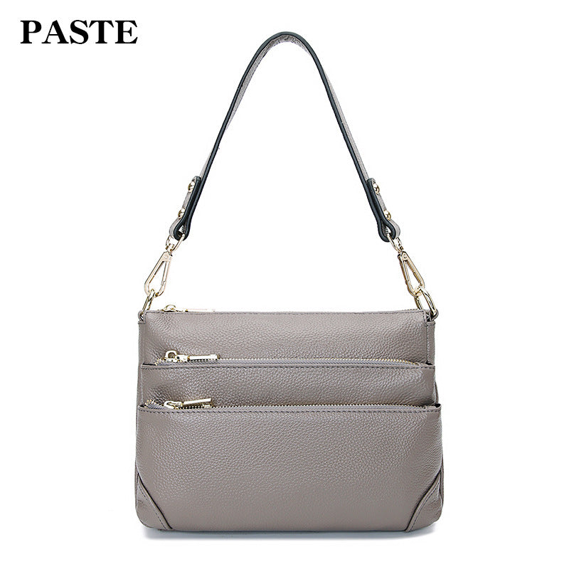 2023 spring and summer new style genuine leather women's bag with multiple zipper compartments, shoulder crossbody bag, first-layer cowhide handbag, trendy 2006