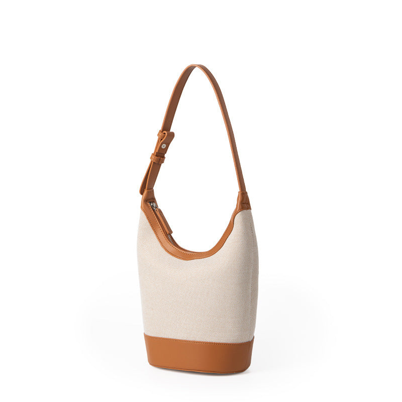 Japanese and Korean retro canvas splicing armpit bag 2023 new summer bucket bag casual niche bag women's shoulder bag