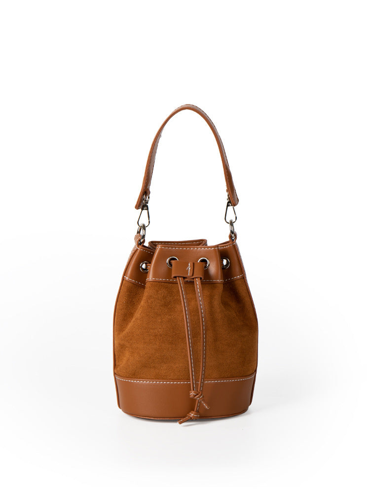 Niche retro high-end suede bucket bag 2023 autumn and winter new style spliced PU shoulder bag versatile handbag