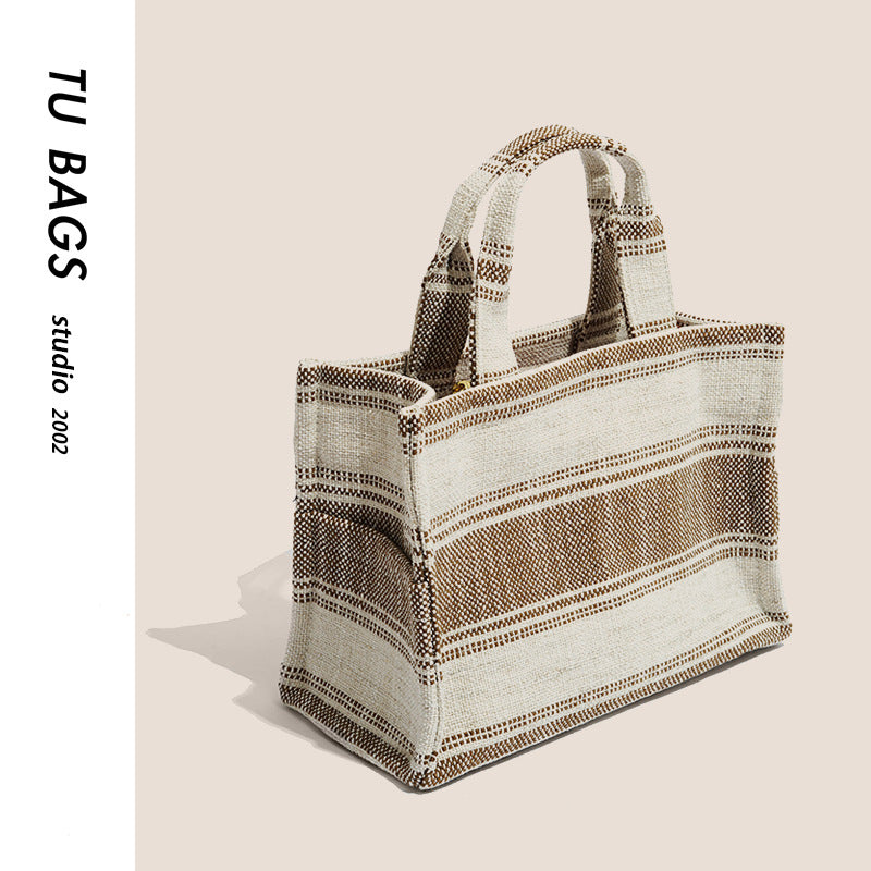 Shoulder bag for women 2023 new tote bag niche high-end canvas handbag striped shopping bag striped woven bag