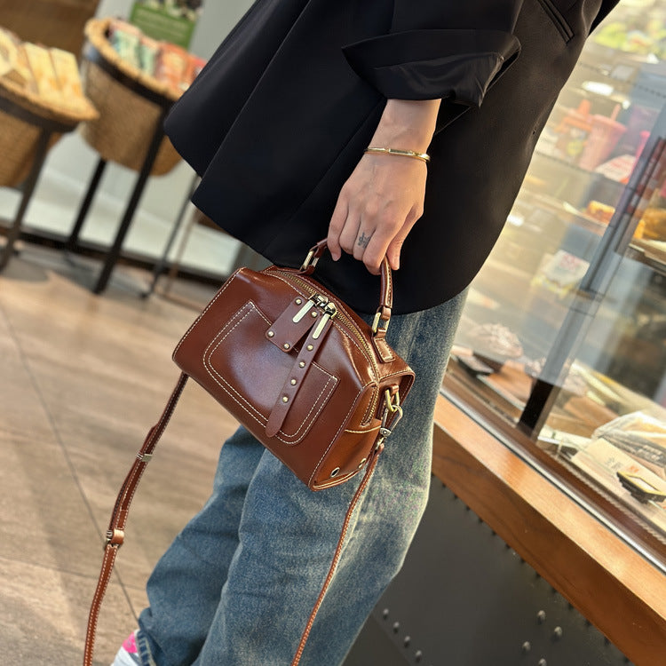 Boston Pillow Bag Women's 2023 New Genuine Leather Crossbody Bag Women's Portable Top Layer Vegetable Tanned Cowhide Bag Commuting Fashion