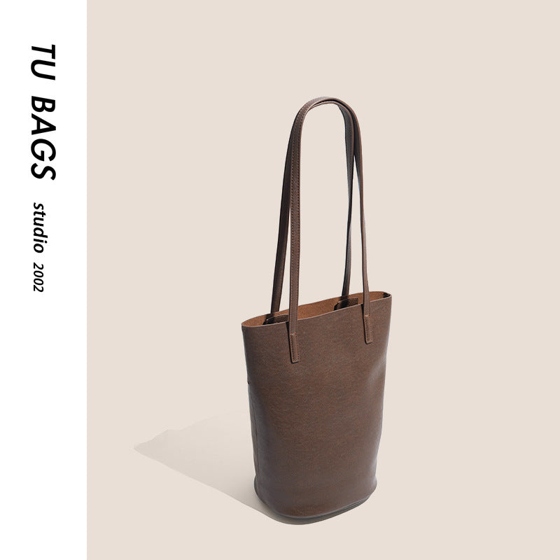 Genuine leather bucket bag for women 2023 new style lazy retro shoulder bag niche soft leather women's bag commuter armpit tote bag