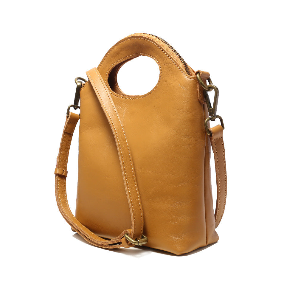 2023 spring and summer new style retro casual versatile niche design top layer tree paste leather portable shoulder crossbody women's bag