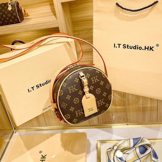 Hong Kong niche design round cake bag women's crossbody bag round small bag shoulder bag women's bag 2023 spring and summer new style