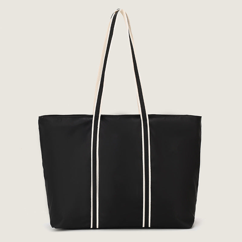 2023 new Korean version of practical large-capacity fashionable simple tote bag for women with high-end sense without rib shoulder strap shoulder bag