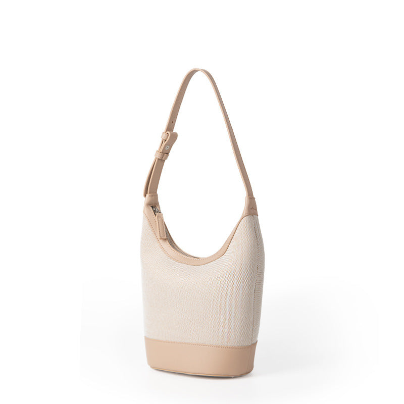 Japanese and Korean retro canvas splicing armpit bag 2023 new summer bucket bag casual niche bag women's shoulder bag