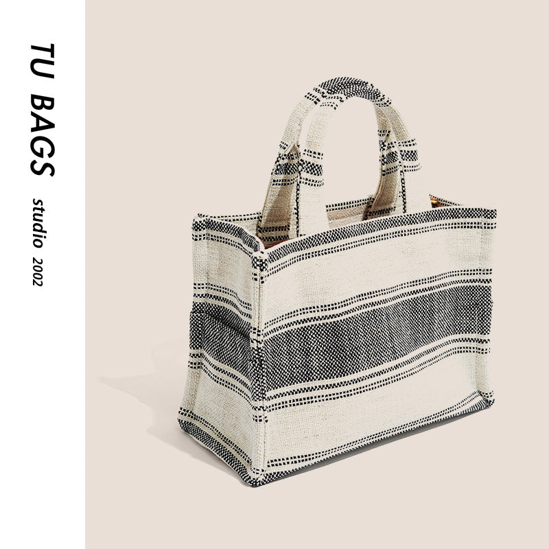 Shoulder bag for women 2023 new tote bag niche high-end canvas handbag striped shopping bag striped woven bag