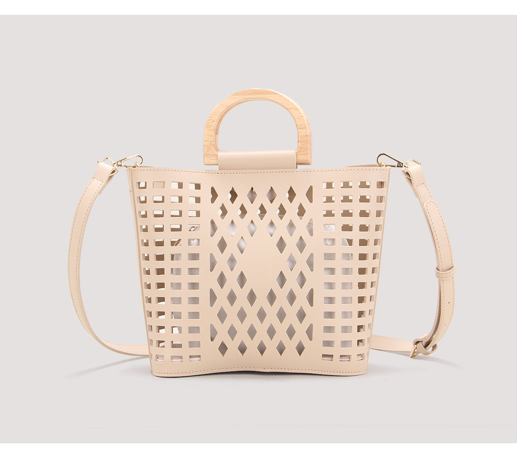 2023 autumn and winter new style, versatile, fashionable and simple one-shoulder crossbody bag, retro wooden ring, hollow mother-in-law bag, bucket bag