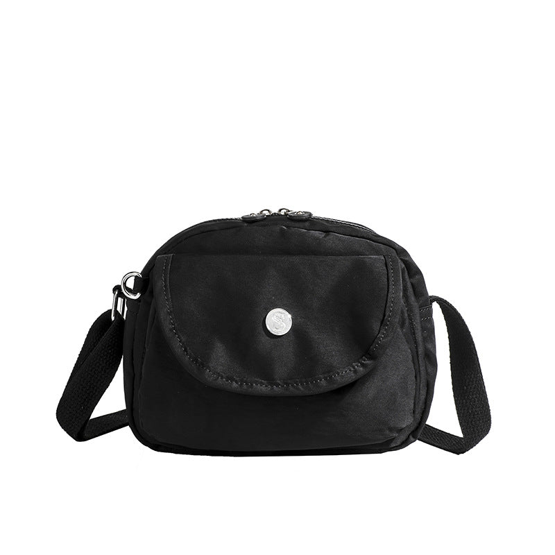 New semi-circle bag women's waterproof crossbody bag classic one-shoulder flip small square bag Western style light canvas bag shell bag