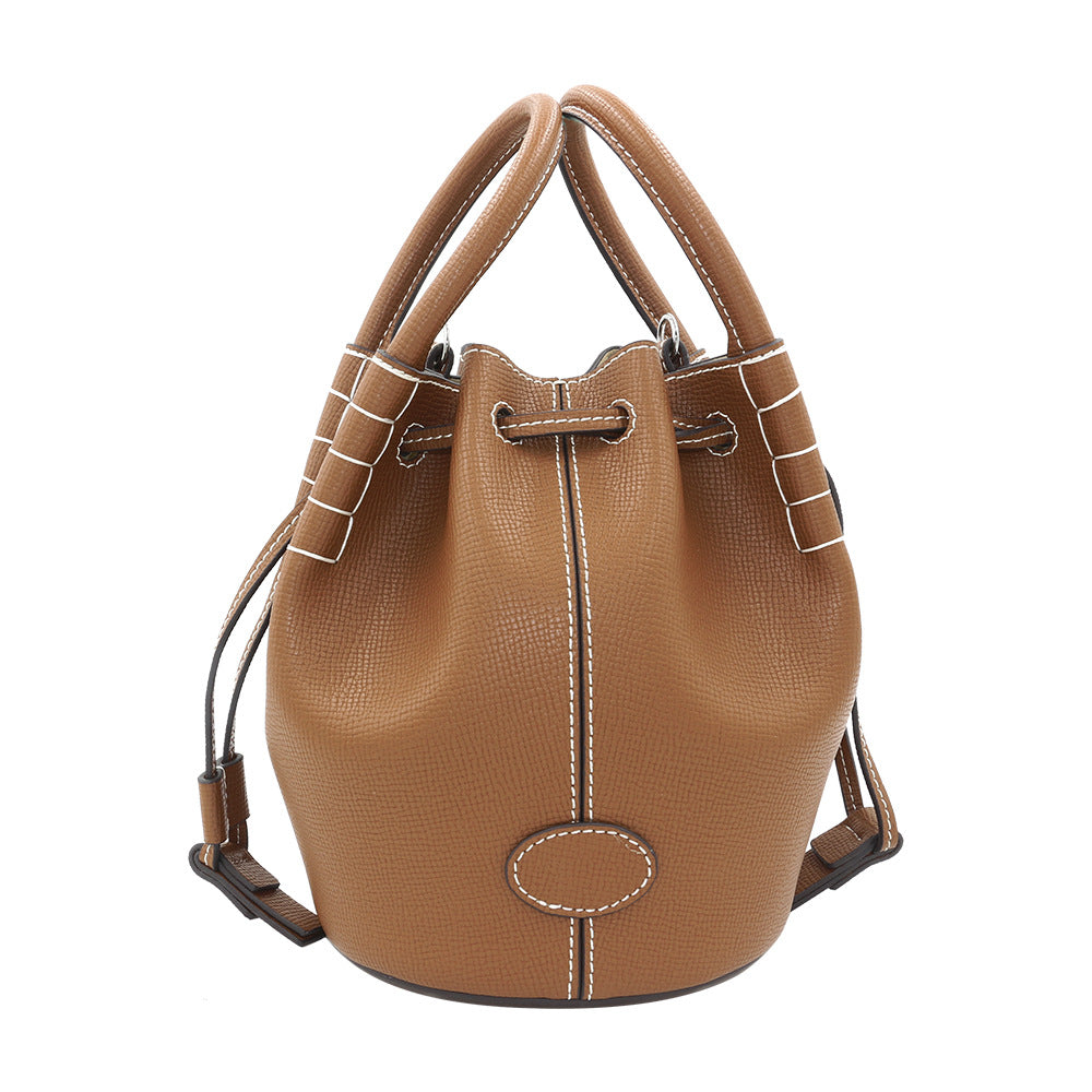 Autumn and winter new trendy and fashionable commuting style portable bucket bag cowhide large-capacity drawstring single shoulder cross-body bag for women