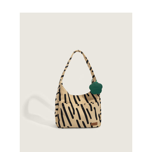 Wholesale niche high-end zebra pattern canvas bag 2022 new large-capacity tote bag female student school shoulder bag