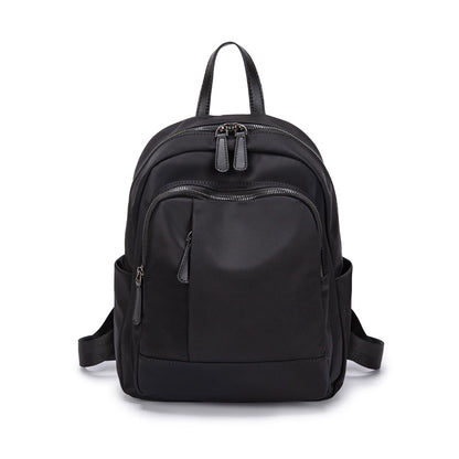 2023 New Simple School Bag Female College Student Niche Non-Contrast Model Junior High School Student Large Capacity Oxford Cloth Backpack