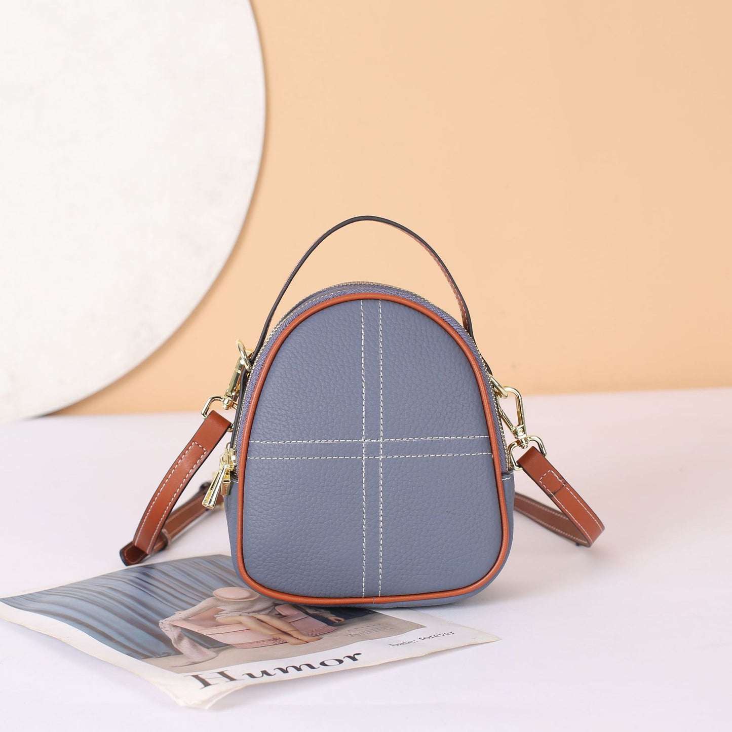 2022 new top-layer cowhide women’s bag, shoulder cross-body women’s bag, cute and fashionable egg-shaped multi-compartment